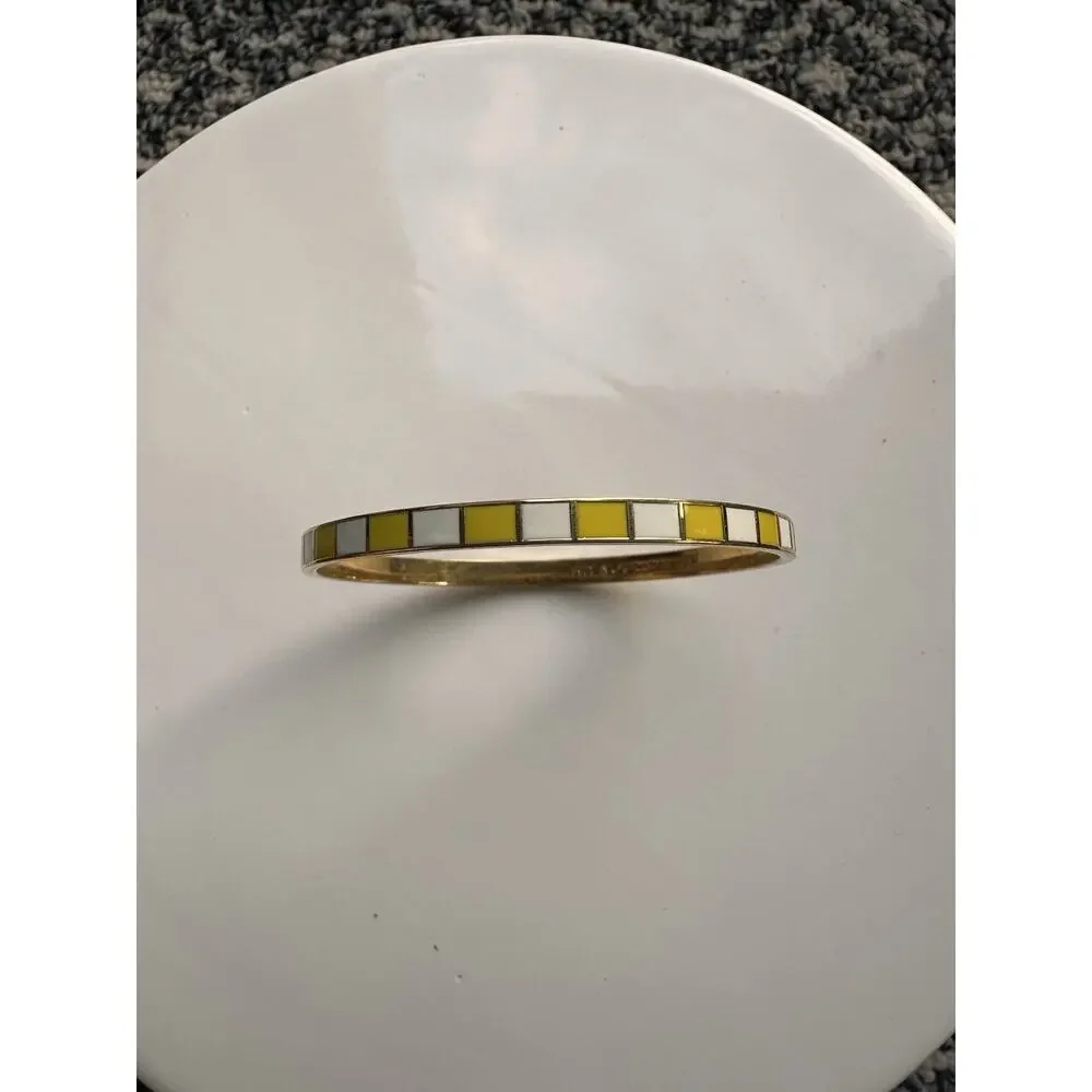 Kate Spade Hit Your Stride Idiom Bangle Gold Tone Yellow White Enamel - Picture 1 of 11